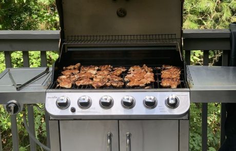 Barbeque grilling chicken on Deck